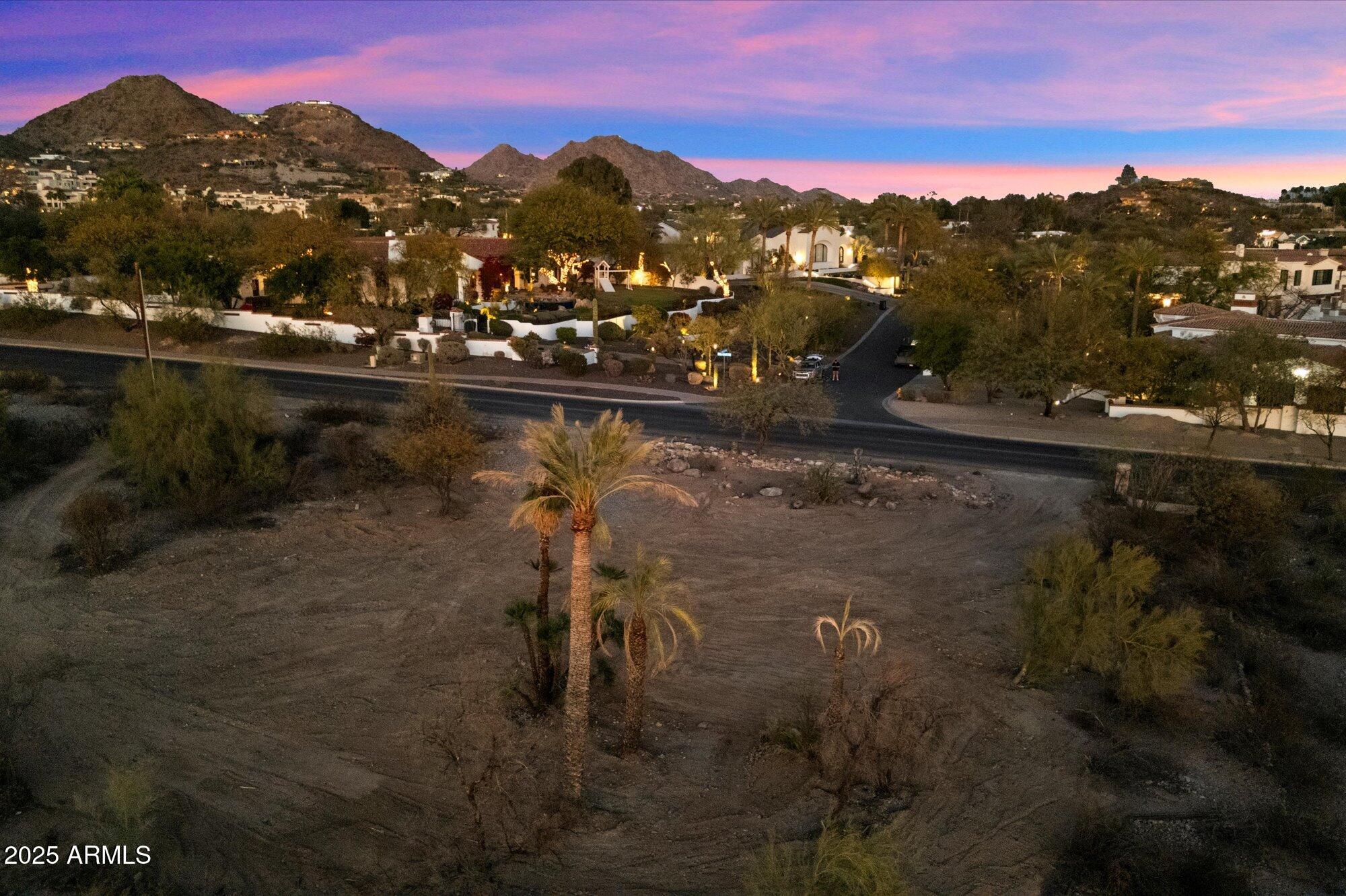 6218 North Palo Cristi Road, Unit 10 Paradise Valley, AZ 85253 - Photo 11 of 33 a view of a lake in middle of the town