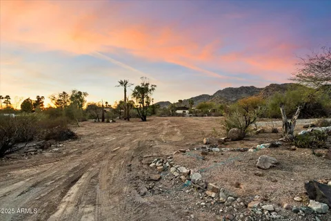 a view of a road with a building in the background