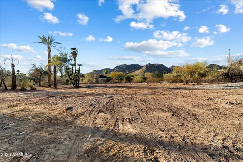a view of a town with mountains