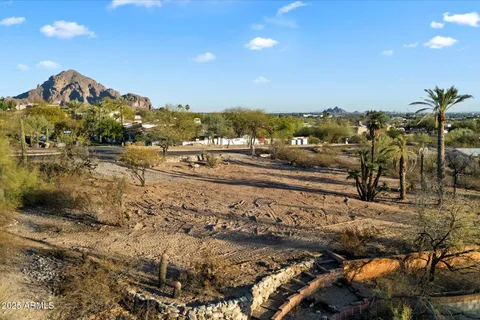 an aerial view of residential house with parking space