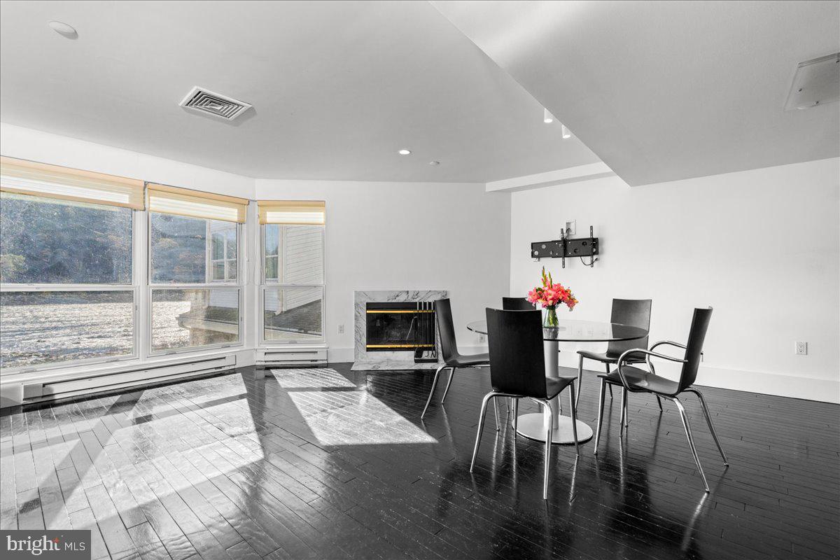 350 River Road, Unit D10 New Hope, PA 18938 - Photo 13 of 41 a living room with furniture and a fireplace