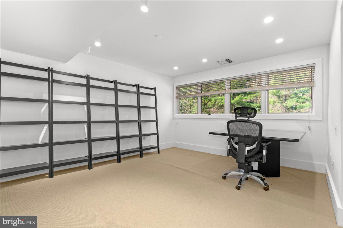 350 River Road, Unit D10 New Hope, PA 18938 - Photo 16 of 41 a view of a workspace with furniture and a window