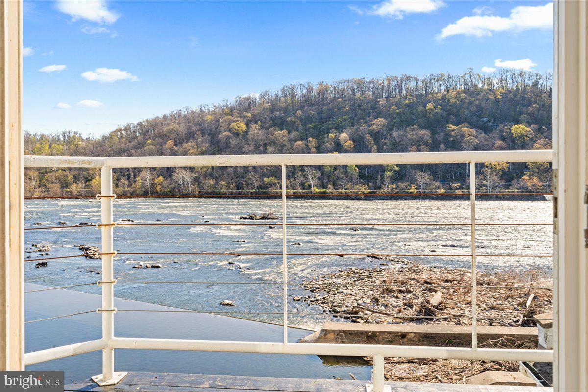 350 River Road, Unit D10 New Hope, PA 18938 - Photo 20 of 41 a view of a balcony with an ocean view