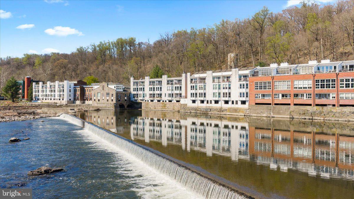 350 River Road, Unit D10 New Hope, PA 18938 - Photo 2 of 41 a view of a swimming pool with a patio