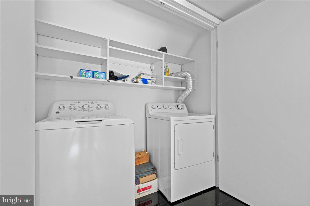 350 River Road, Unit D10 New Hope, PA 18938 - Photo 27 of 41 a utility room with dryer and washer