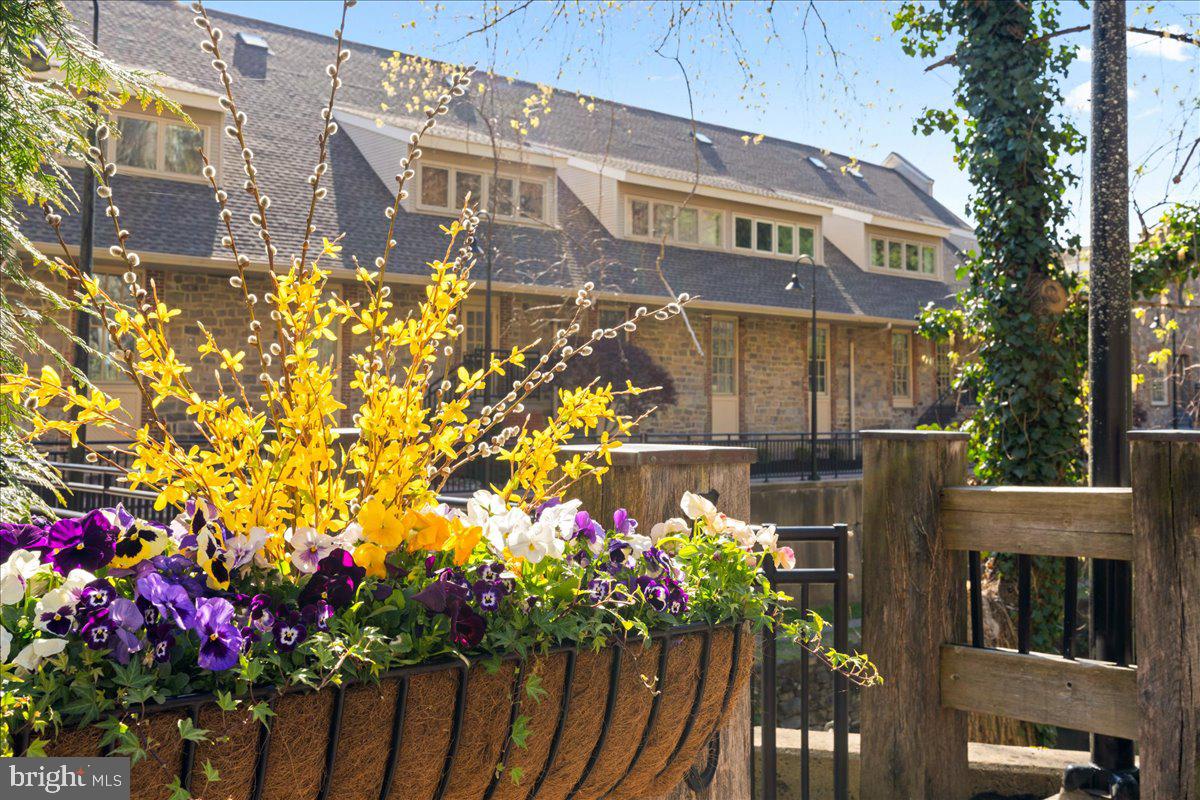 350 River Road, Unit D10 New Hope, PA 18938 - Photo 28 of 41 a front view of a house with a lot of flowers