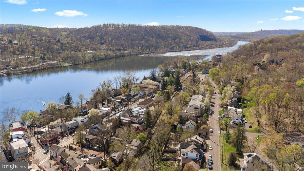 350 River Road, Unit D10 New Hope, PA 18938 - Photo 4 of 41 a view of a lake in middle of the town