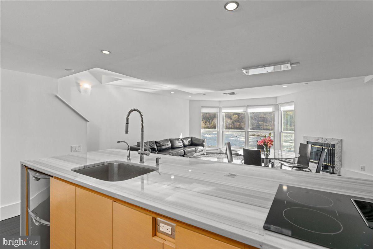 350 River Road, Unit D10 New Hope, PA 18938 - Photo 10 of 41 a kitchen with a sink and a large window