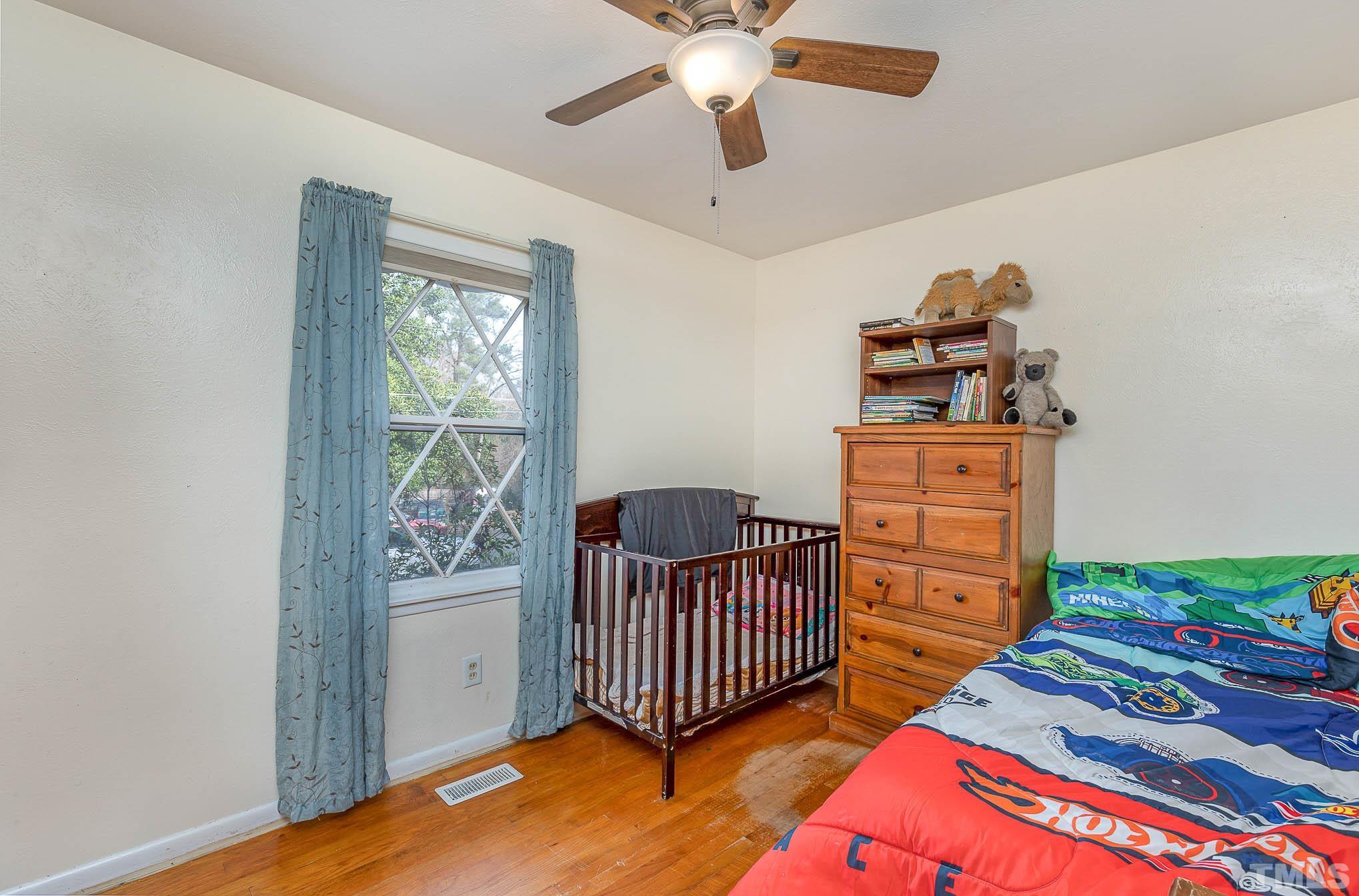 3625 Drayton Road Fayetteville, NC 28303 - Photo 15 of 23 a bedroom with furniture and a window