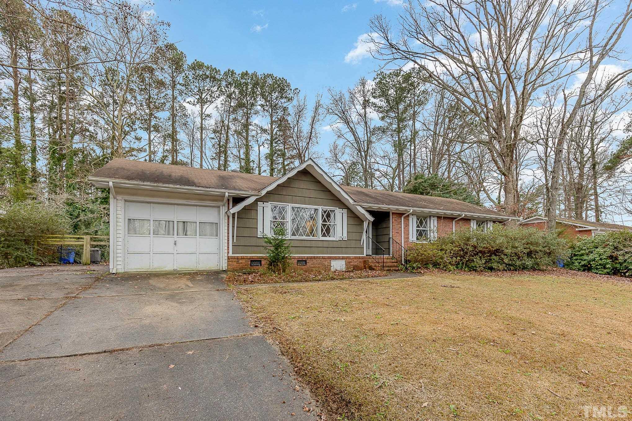 3625 Drayton Road Fayetteville, NC 28303 - Photo 2 of 23 a house with trees in the background