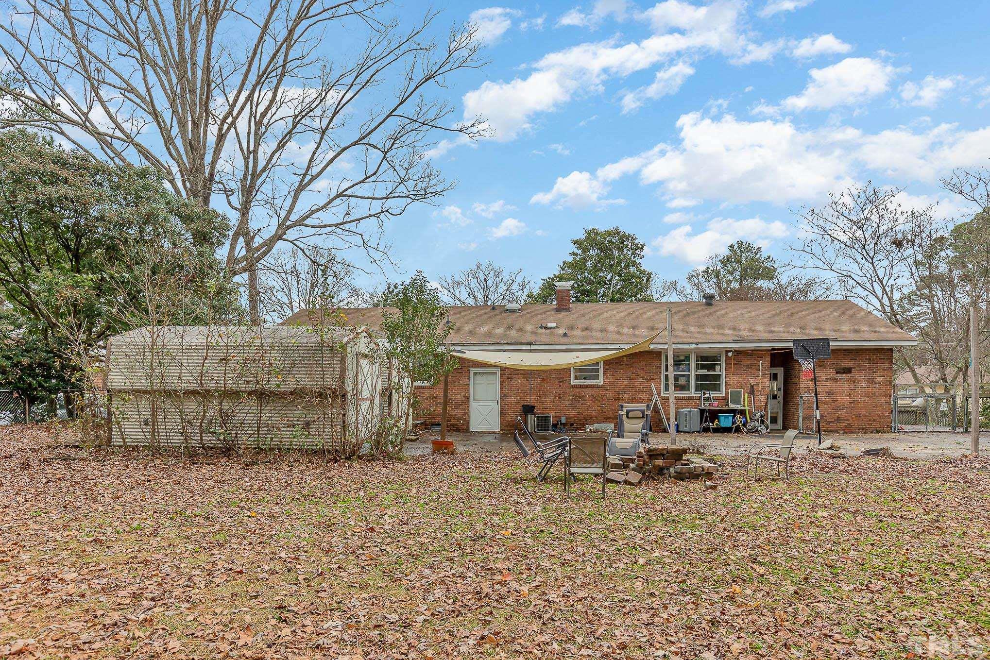 3625 Drayton Road Fayetteville, NC 28303 - Photo 23 of 23 a view of a house with a yard