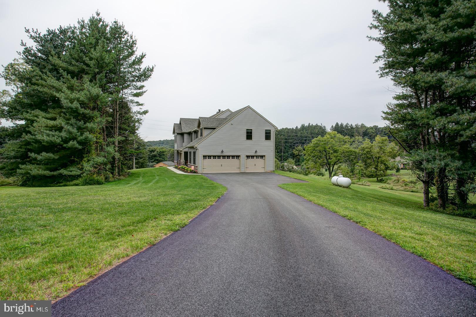 88 Mt Penn Road Reading, PA 19607 - Photo 2 of 35 Side Exterior- Expansive Macadam Driveway