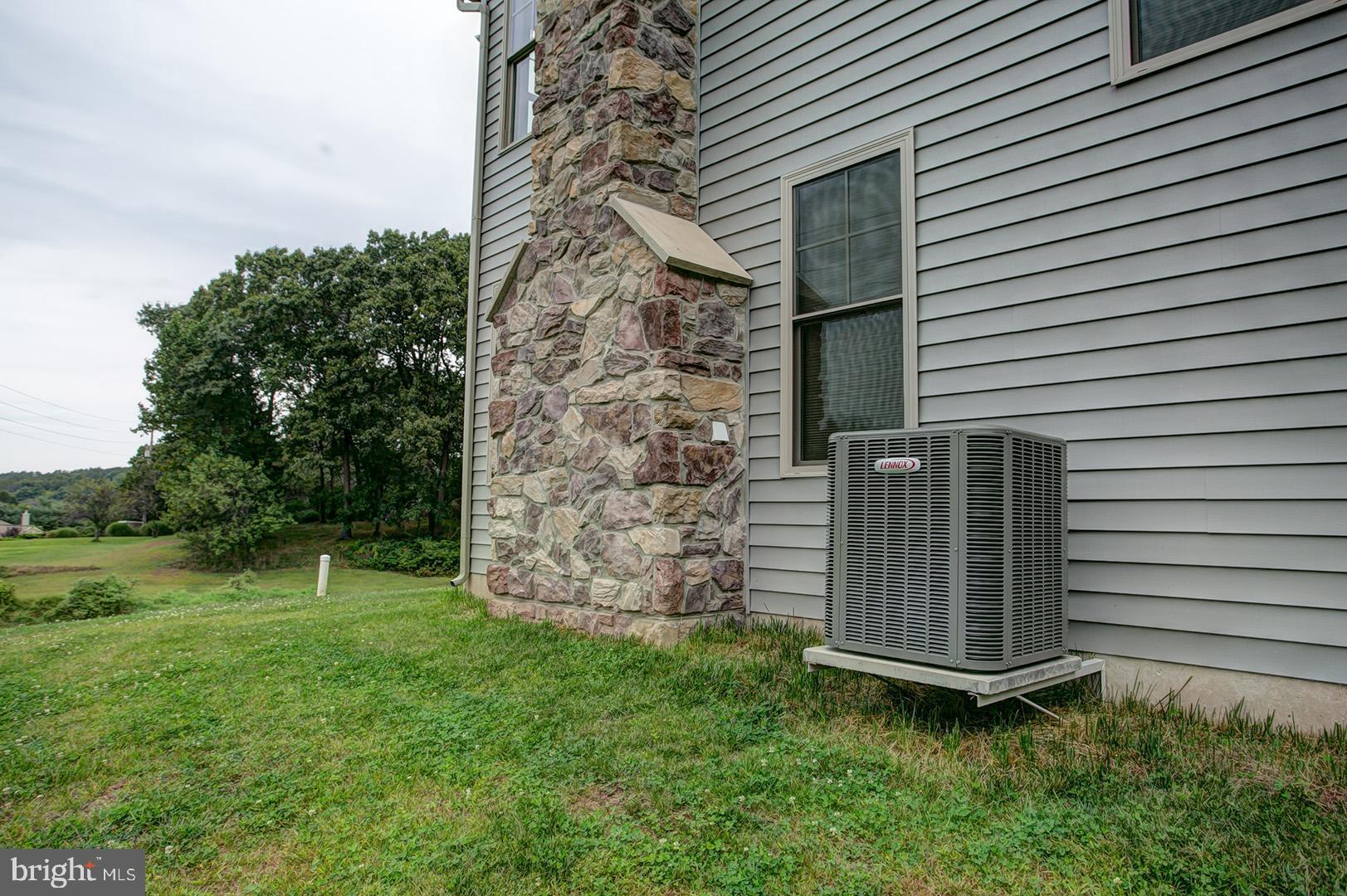 88 Mt Penn Road Reading, PA 19607 - Photo 6 of 35 Side Exterior- Stone Fireplace Chimney/Central Air