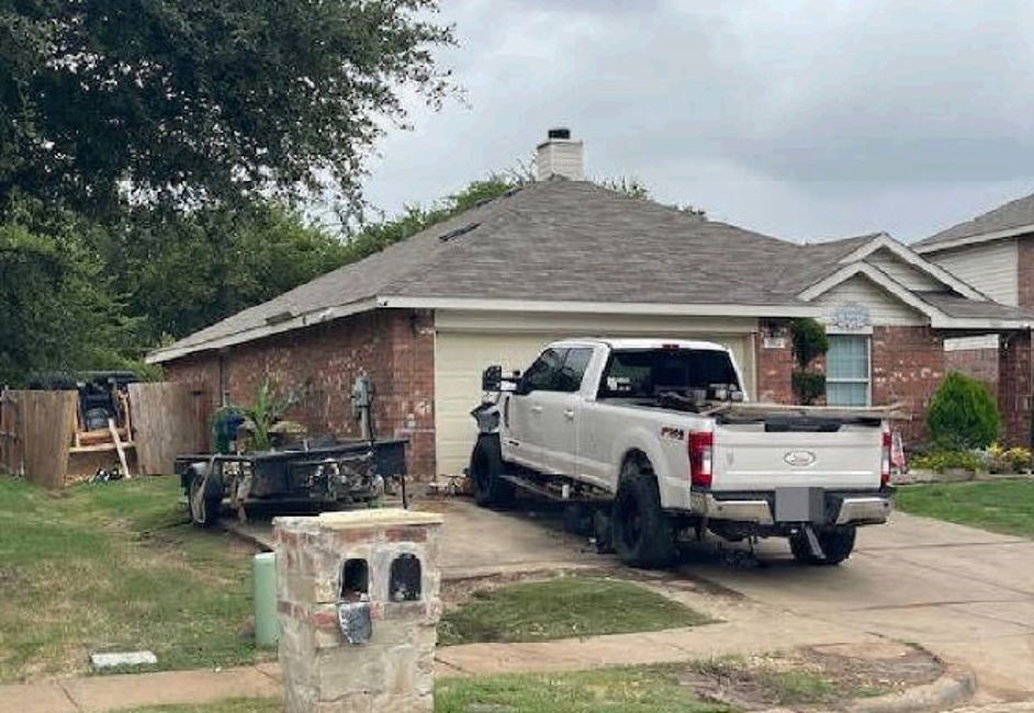 1144 Switchgrass Lane Crowley, TX 76036 - Photo 3 of 4 a white car parked in front of house