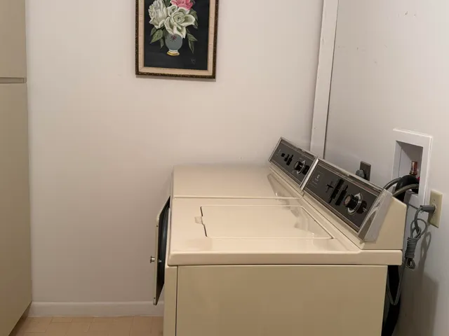 a room with a sink a stove and a refrigerator