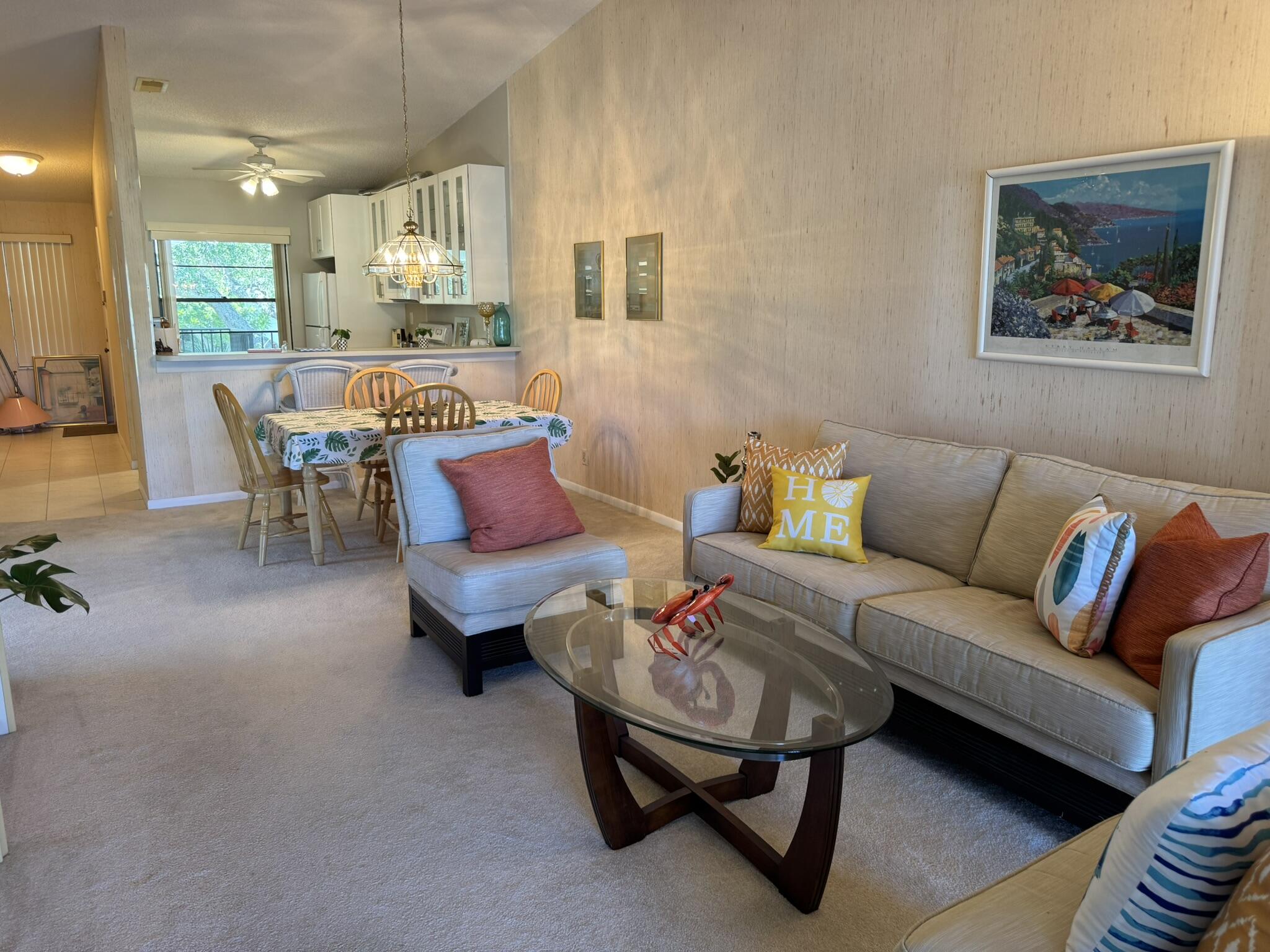 801 Sabal Ridge Circle, Unit H Palm Beach Gardens, FL 33418 - Photo 5 of 42 a living room with furniture and a rug