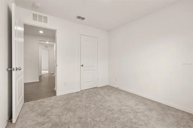 a bathroom with a shower and a sink