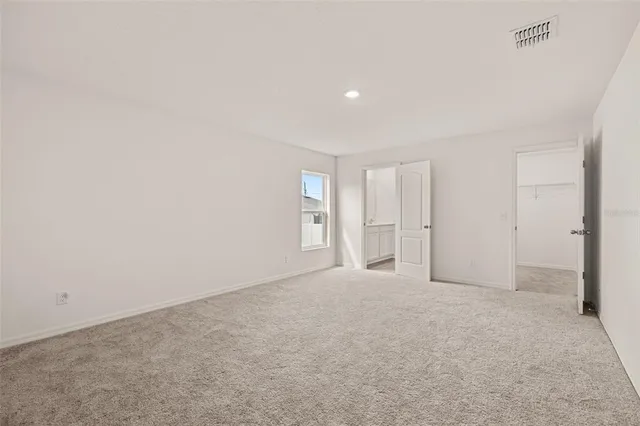 a view of backyard with large trees