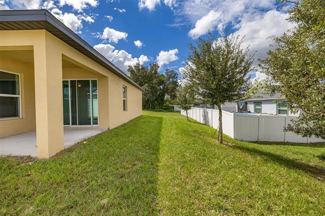 an aerial view of residential building and trees