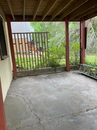 a view of an empty room with a balcony
