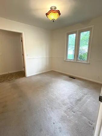 an empty room with a window