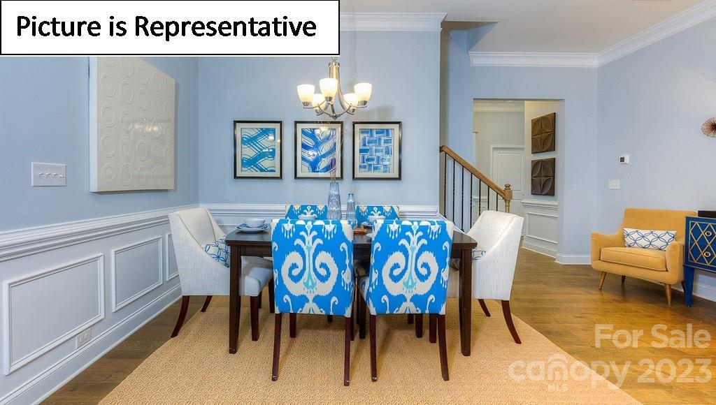 4190 Millstream Road Denver, NC 28037 - Photo 15 of 33 a view of a dining room with furniture