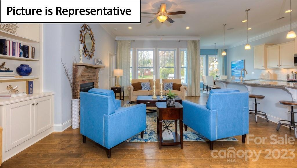 4190 Millstream Road Denver, NC 28037 - Photo 17 of 33 a living room with furniture and a kitchen view
