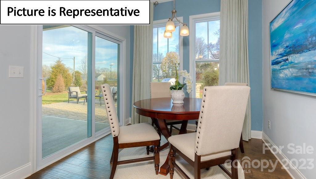4190 Millstream Road Denver, NC 28037 - Photo 22 of 33 a view of a room with a table and chairs