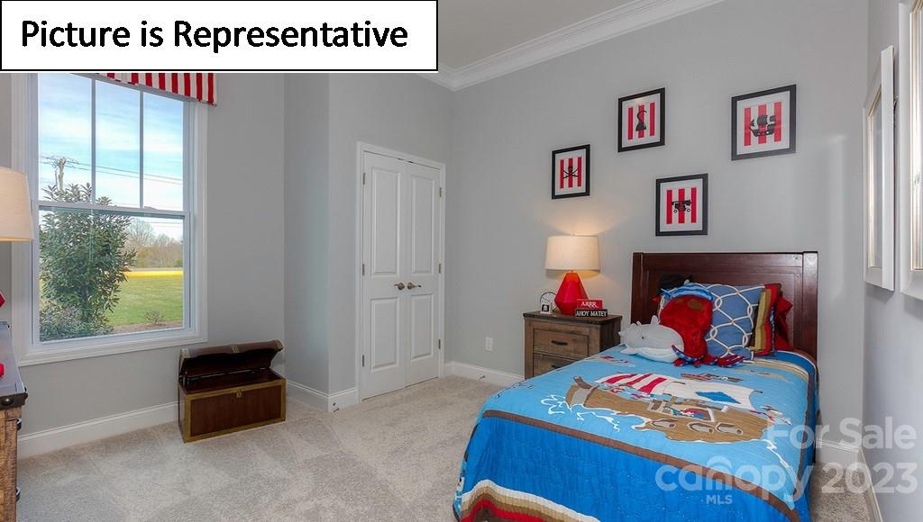 4190 Millstream Road Denver, NC 28037 - Photo 3 of 33 a bedroom with a bed and a window