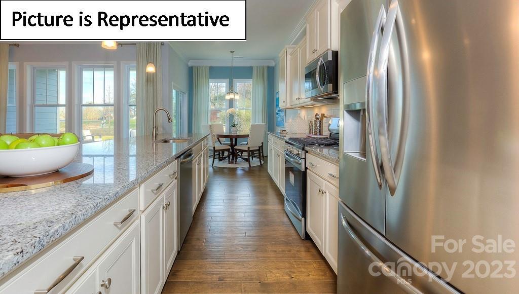 4190 Millstream Road Denver, NC 28037 - Photo 10 of 33 a hallway with wooden floor
