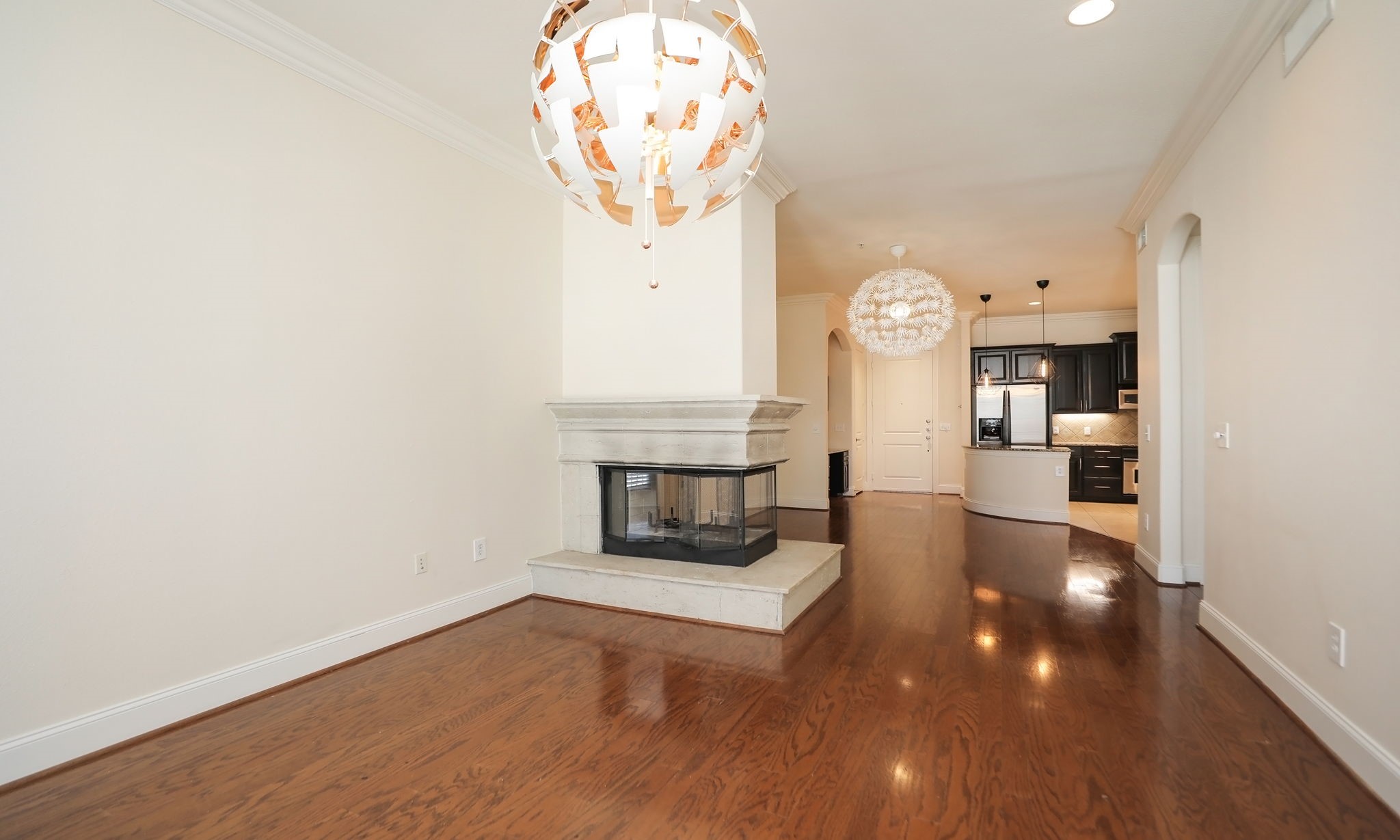 2120 Kipling Street, Unit 402 Houston, TX 77098 - Photo 17 of 30 a view of a living room with a fireplace