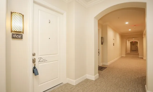 a view of a hallway with closet