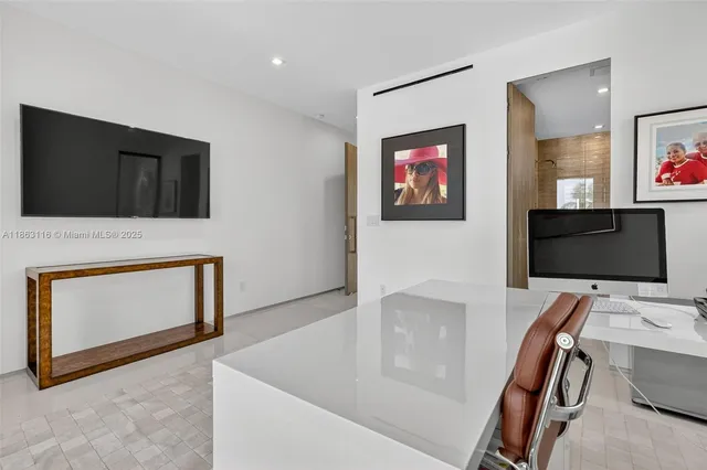 a balcony with furniture and a garden