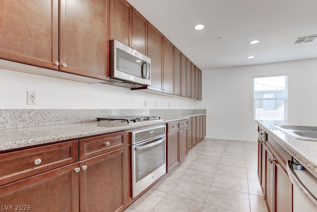 4650 Ranch House Road, Unit 47 North Las Vegas, NV 89031 - Photo 10 of 43 A well-appointed kitchen features ample cabinetry and a practical layout for daily use.