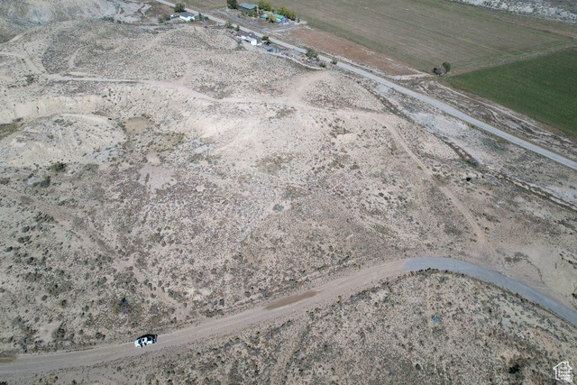 100 West Cemetery Road Wellington, UT 84542 - Photo 2 of 4 Aerial overview of property's location with rural landscape and abundant farmland
