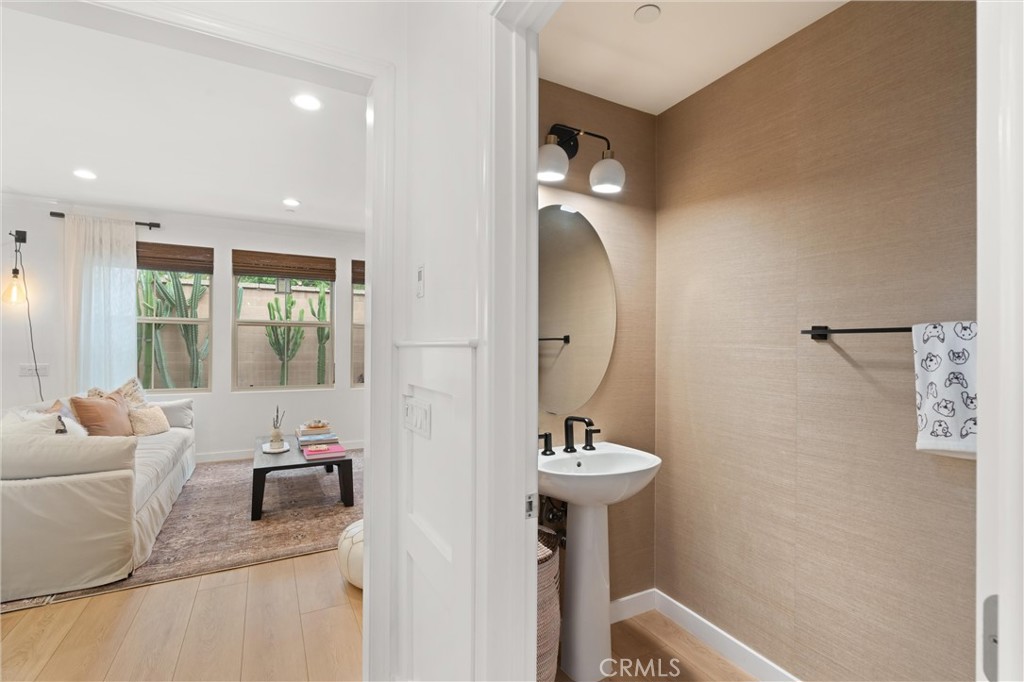 112 Gemstone Irvine, CA 92620 - Photo 6 of 41 Half Bath with Phillip Jeffries Grass Cloth Wall Covering
