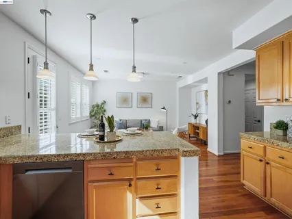 a kitchen with sink cabinets and window