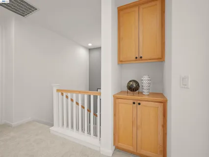 a view of storage and utility room with washer and dryer