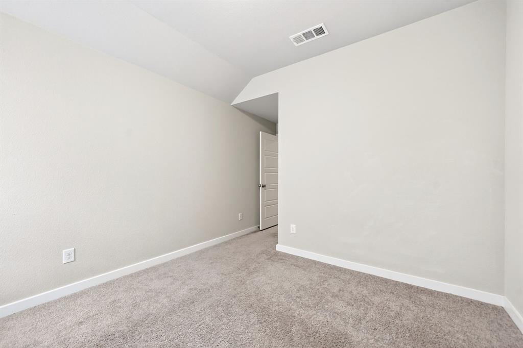 1810 Rhea Court Celina, TX 75009 - Photo 17 of 32 This room features light-colored walls, carpeted flooring, and a white baseboard