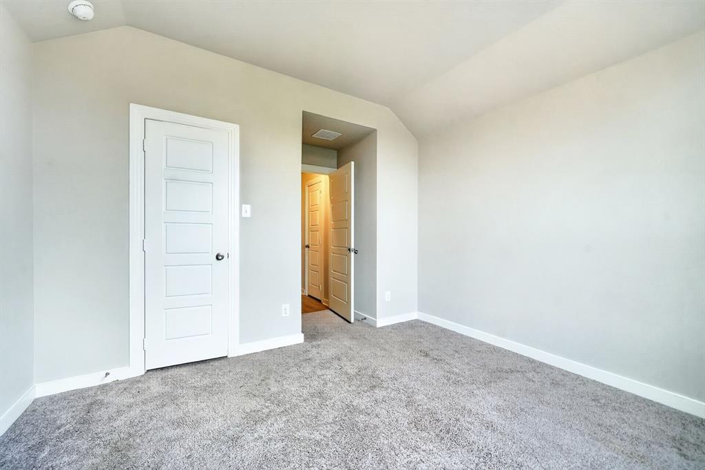 1810 Rhea Court Celina, TX 75009 - Photo 20 of 32 This room features gray carpeting, light gray walls, and white trim