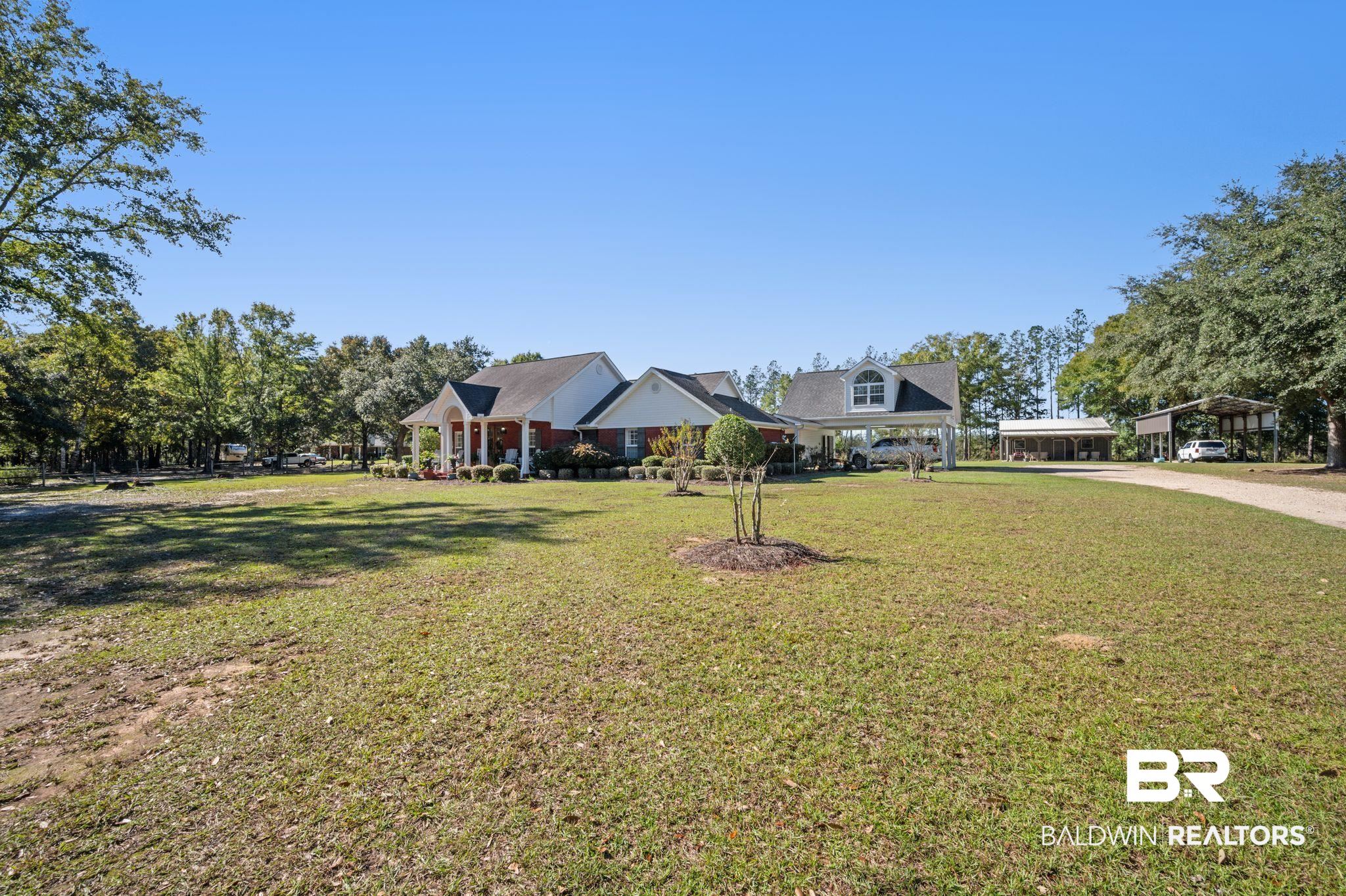 38211-d) V R Byrd Road Bay Minette, AL 36507 - Photo 46 of 58 View of front of house featuring a front yard and a carport