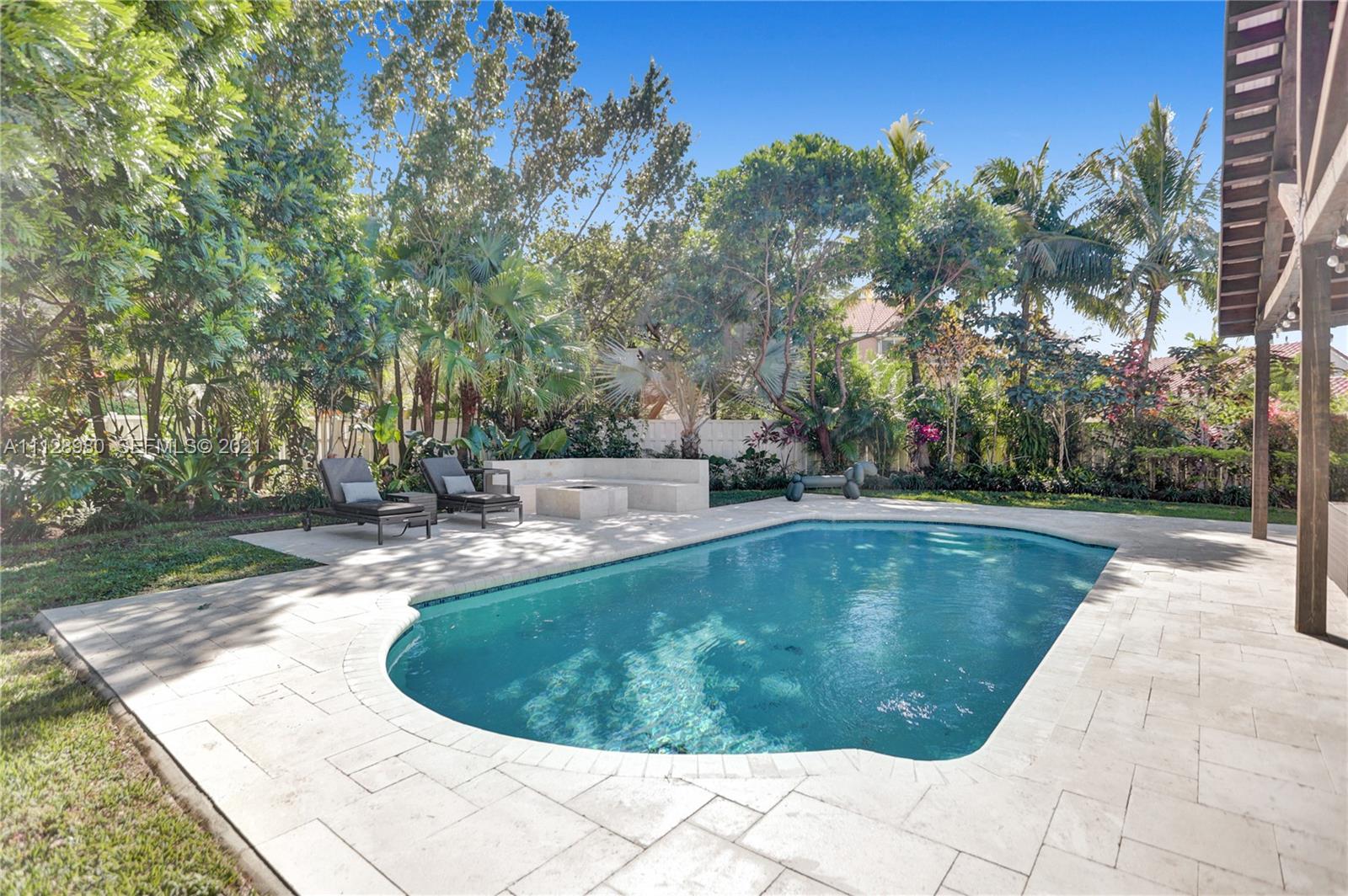 1078 Briar Ridge Road Weston, FL 33327 - Photo 6 of 41 a view of a swimming pool with a yard