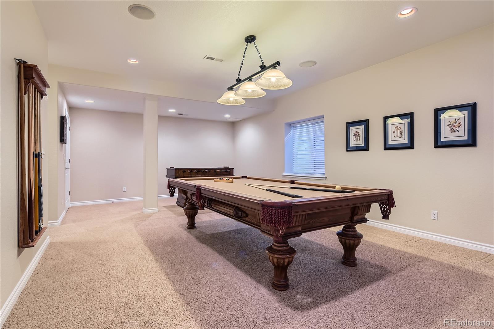 11074 Grayledge Circle Highlands Ranch, CO 80130 - Photo 27 of 47 a room with pool table and windows