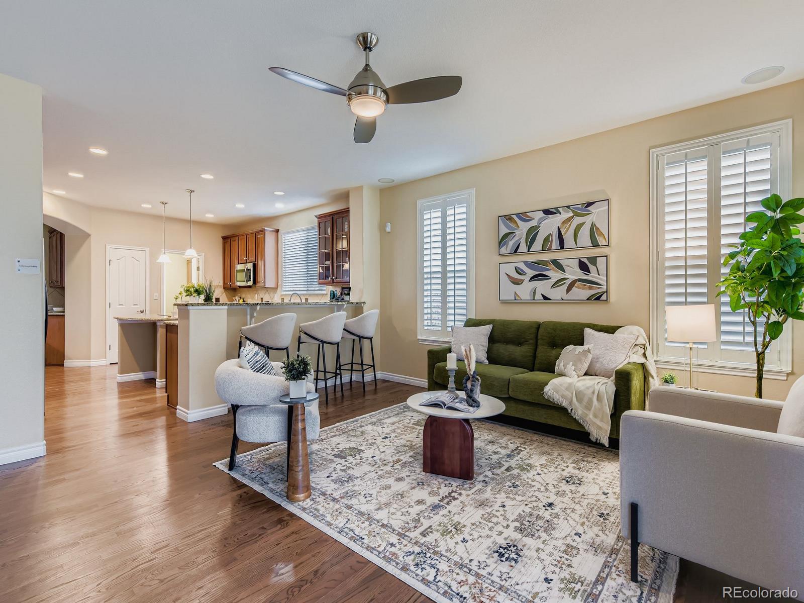 11074 Grayledge Circle Highlands Ranch, CO 80130 - Photo 9 of 47 a living room with furniture and a window