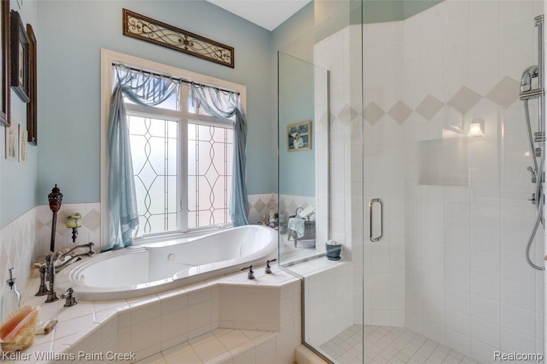 525 Sheldon Court Rochester, MI 48306 - Photo 29 of 66 Enjoy your own private Spa. Unwind in the jetted tub near the beautiful leaded glass window.