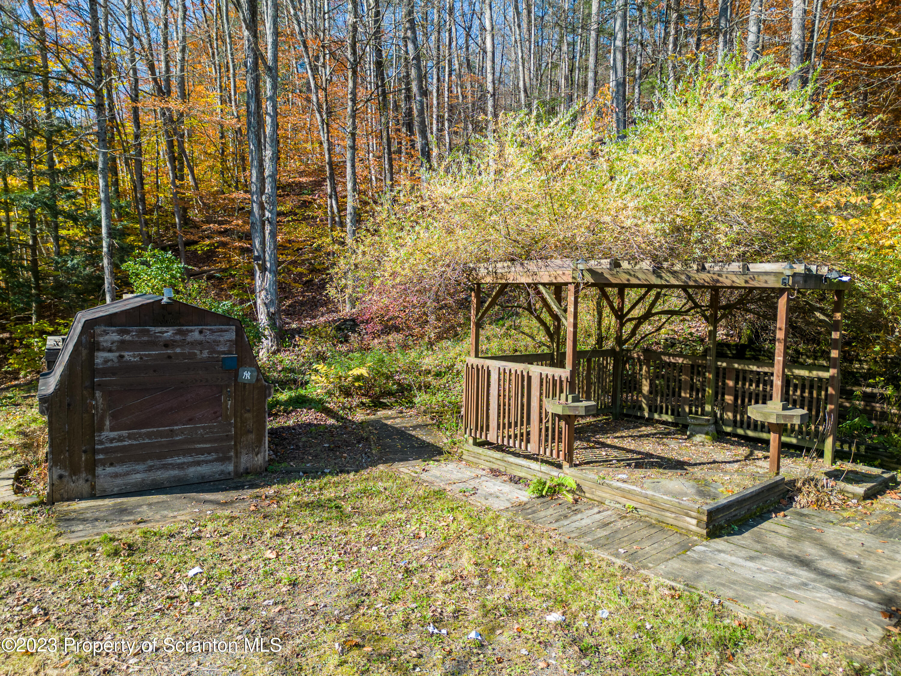 3489 Silver Creek Road Montrose, PA 18801 - Photo 11 of 35 a roof deck with table and chairs and potted plants
