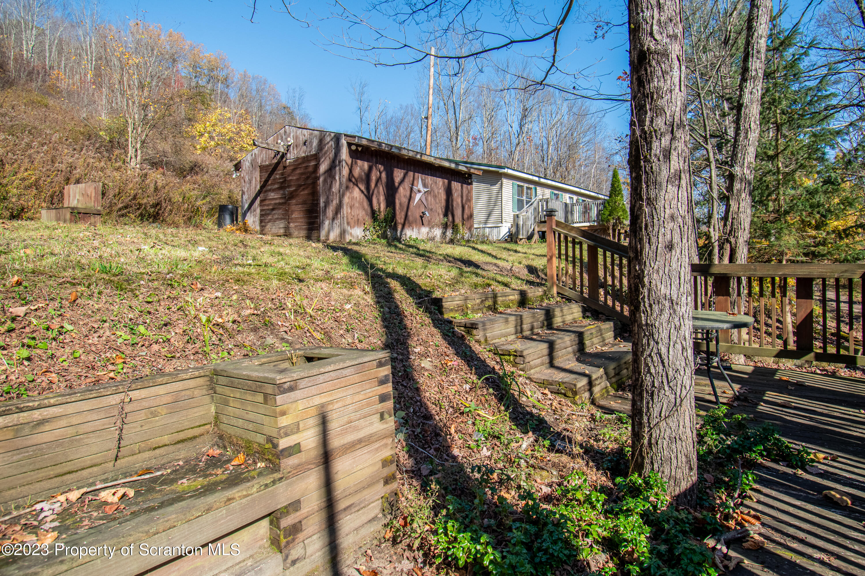 3489 Silver Creek Road Montrose, PA 18801 - Photo 16 of 35 a view of a yard with wooden fence