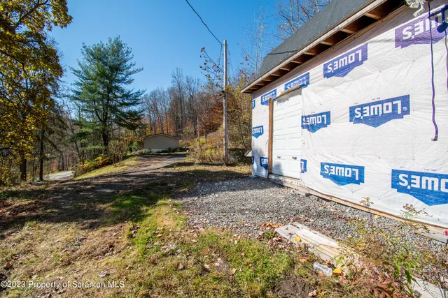 a view of kitchen with furniture and window