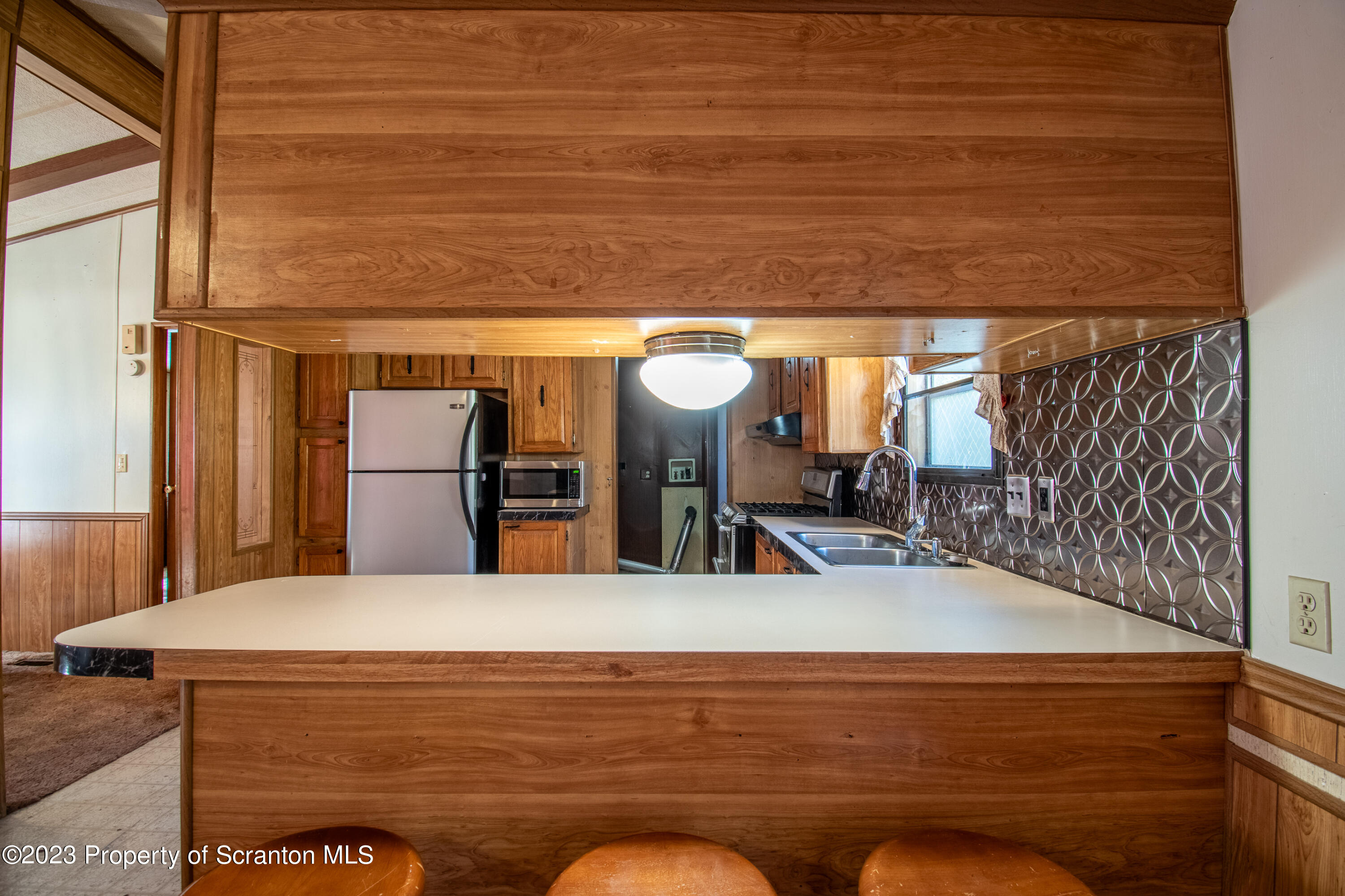 3489 Silver Creek Road Montrose, PA 18801 - Photo 33 of 35 a view of kitchen and wooden floor