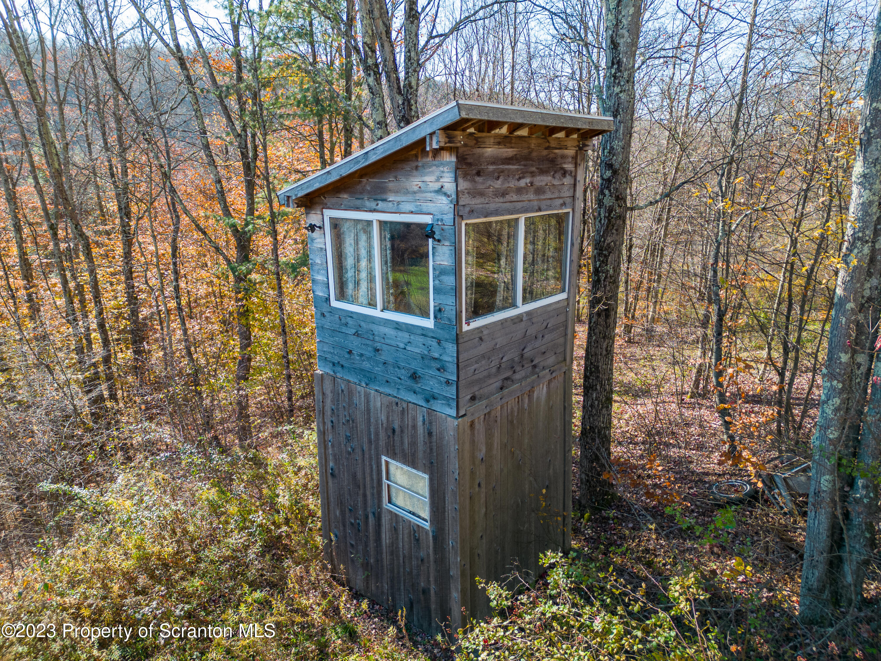 3489 Silver Creek Road Montrose, PA 18801 - Photo 4 of 35 a front view of a house with garden